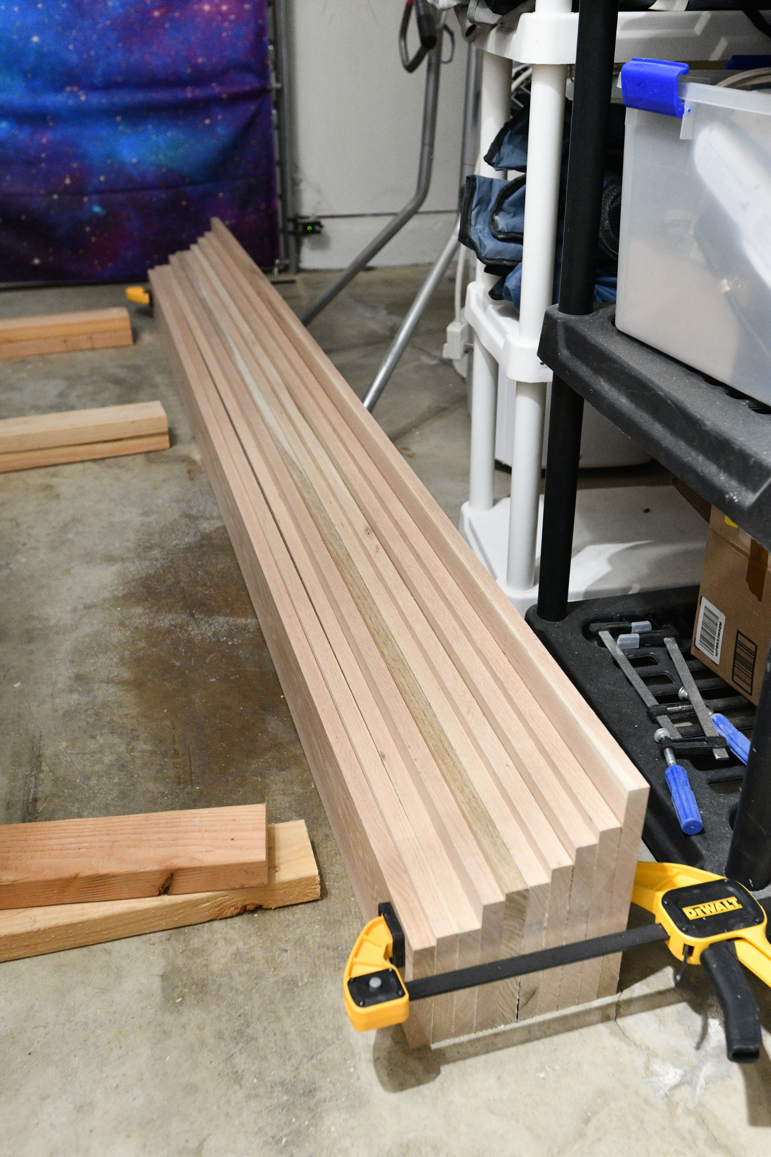 This is the pile of what will become the slats under the mattress. I wanted to preserve as much wood as possible for these, hence the seemingly random widths.