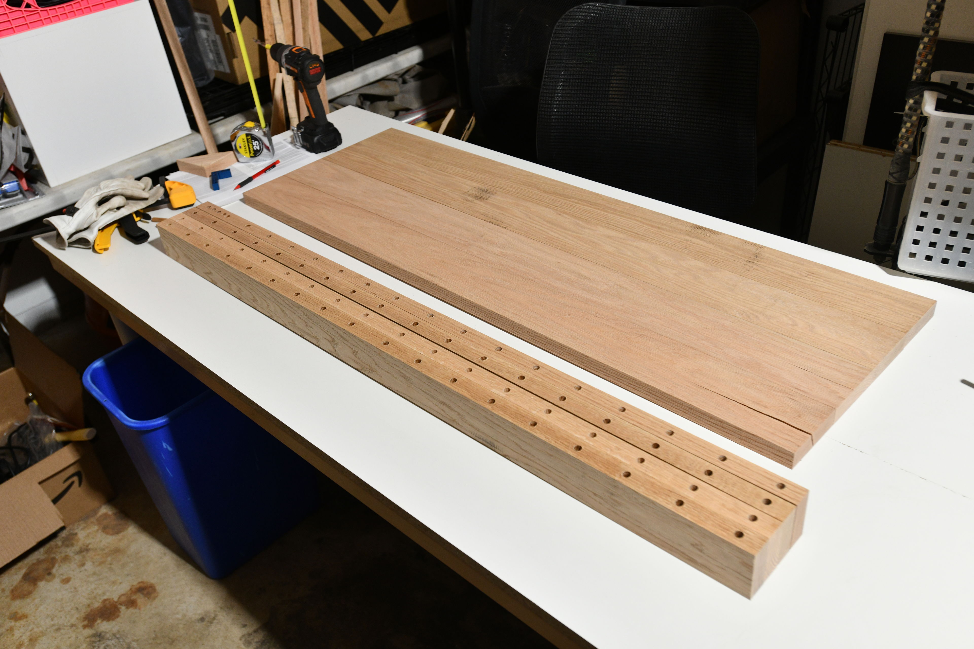 I switched from my original idea of using 4 inch square posts as legs to using two boards joined at a right angle. I decided to use dowels and glue to join these. It was my first time cutting dowel holes, and using a doweling jig.