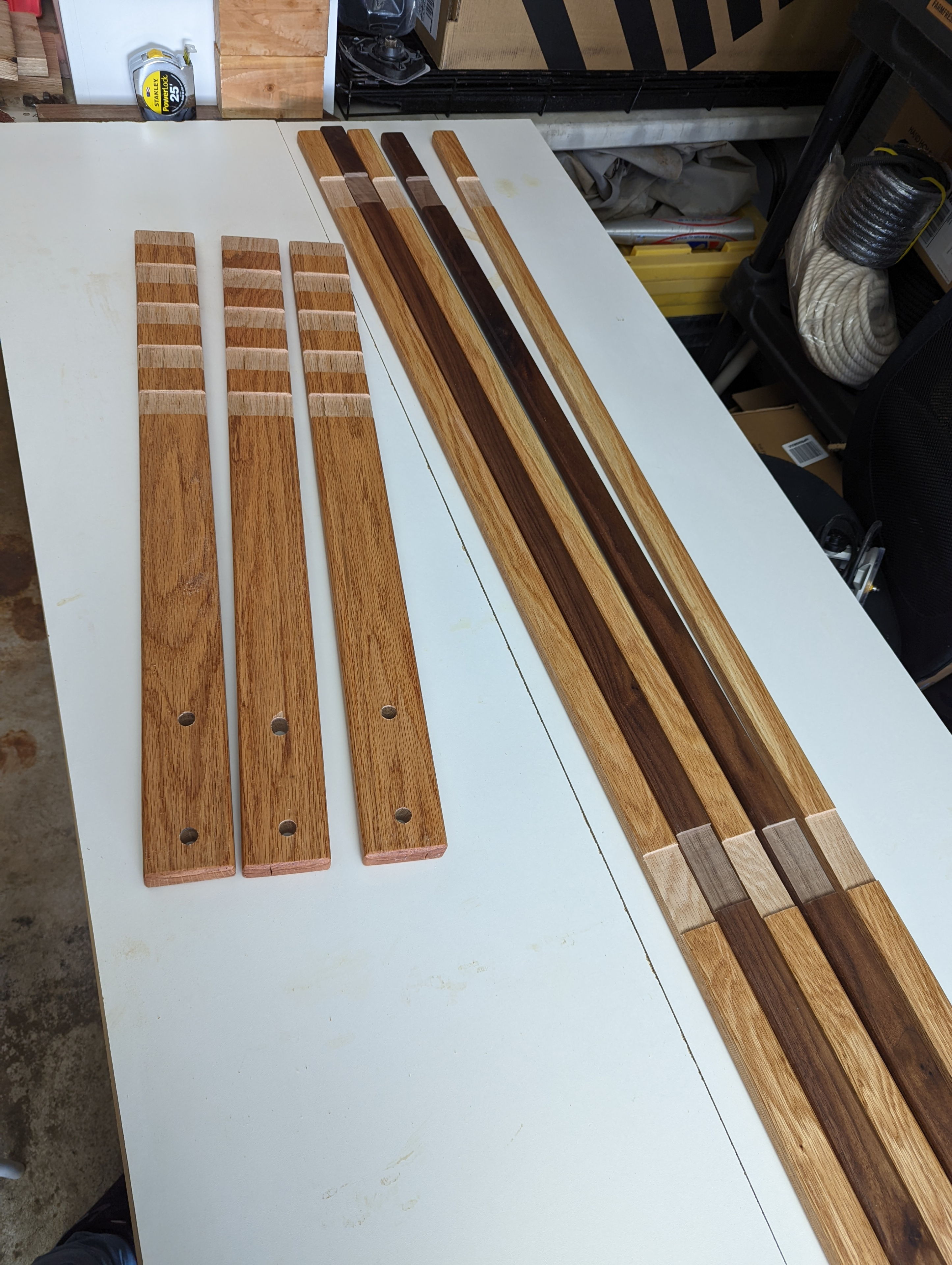 I built the headboard out of a grid of boards with interlocking recesses cut using a cross cut sled and many shallow passes on the table saw, then glued together. This ended up looking much better than my original plan to simply screw them together.