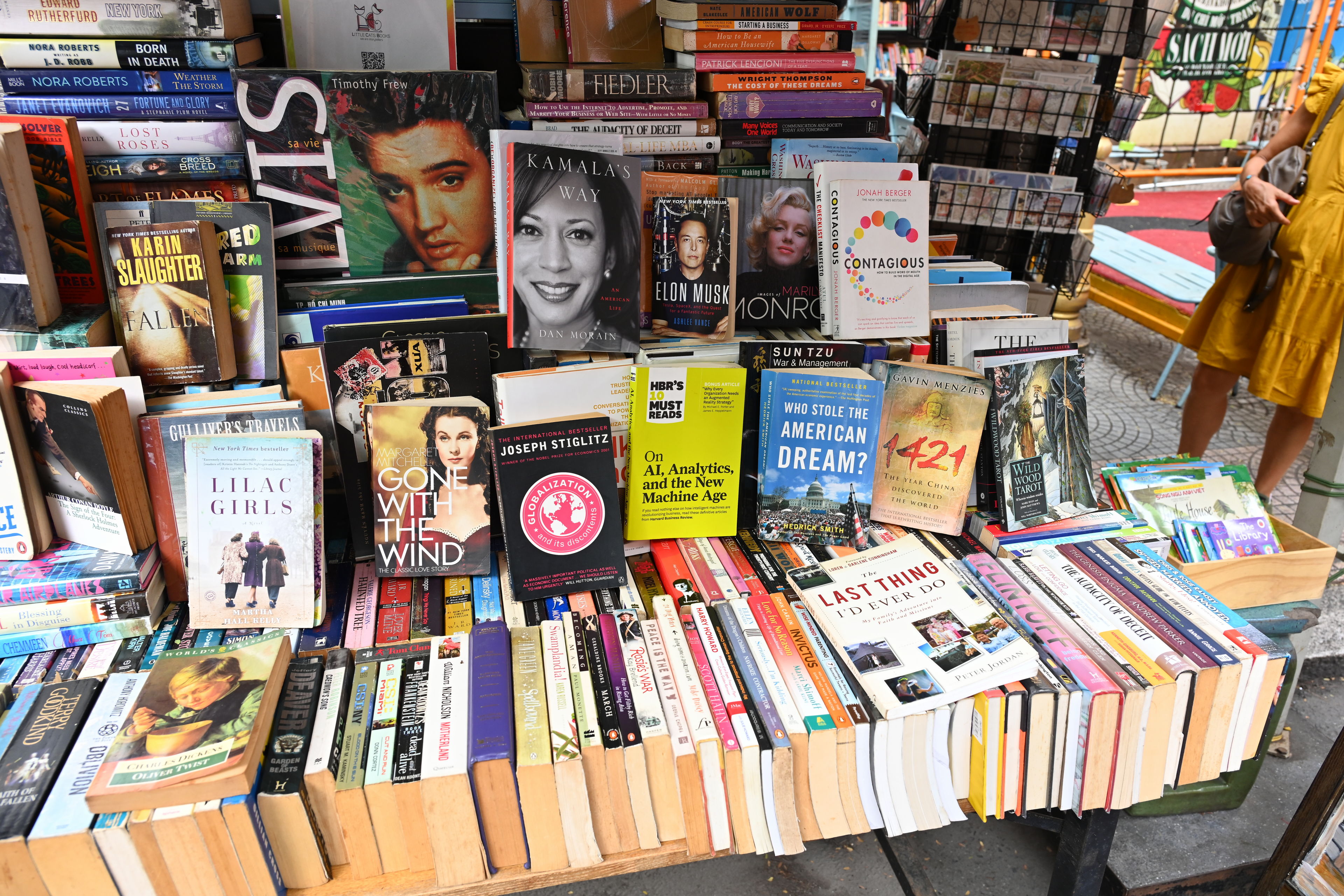 Interesting selection of books at a street sale in Saigon, Vietnam.