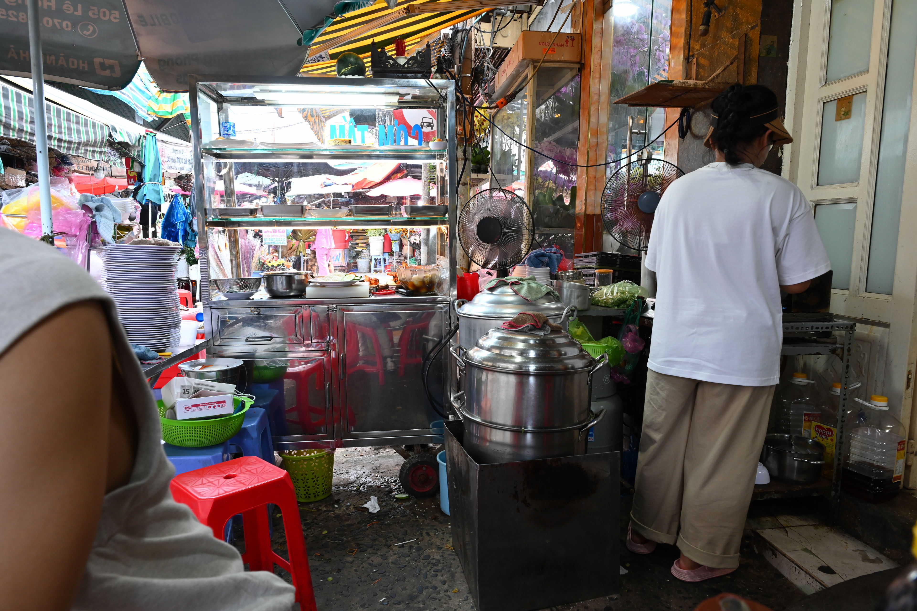 Exploring and getting food at Ho Thi Ky Flower Market, Chợ hoa Hồ Thị Kỷ, in Saigon, Vietnam.