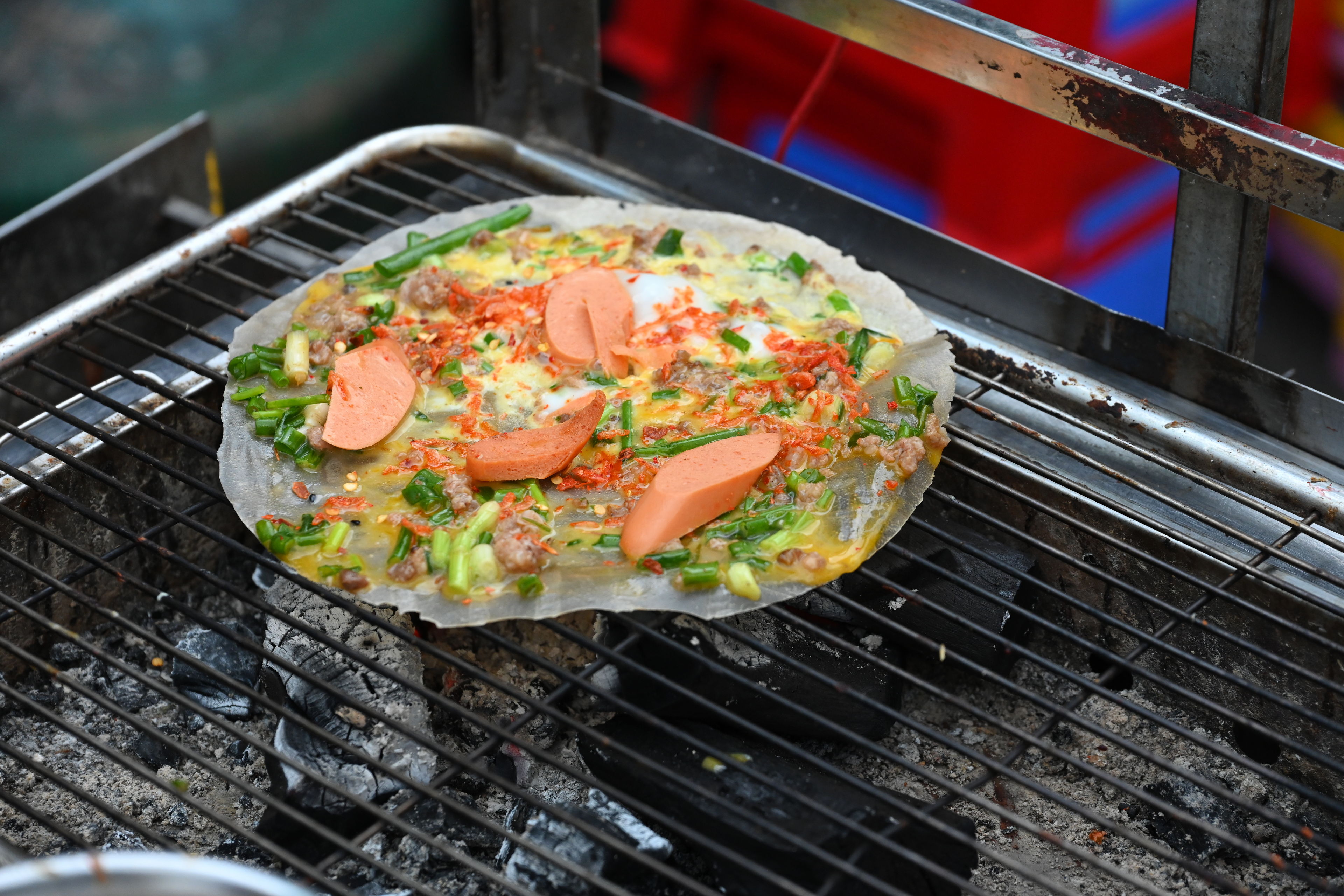 Exploring and getting food at Ho Thi Ky Flower Market, Chợ hoa Hồ Thị Kỷ, in Saigon, Vietnam.