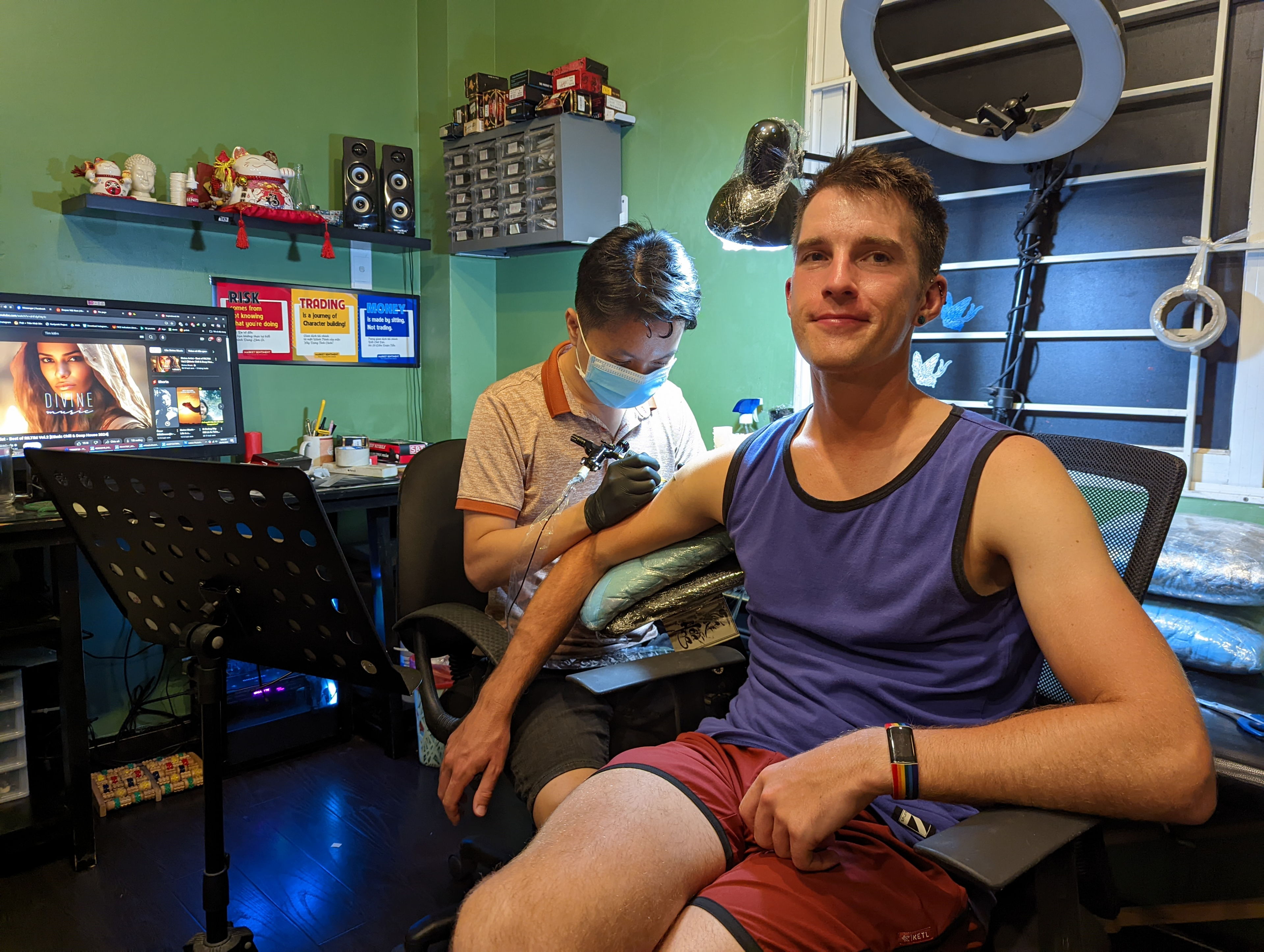 Getting my first tattoos with Matthew at Hoàng Tattoo in Saigon, Vietnam.