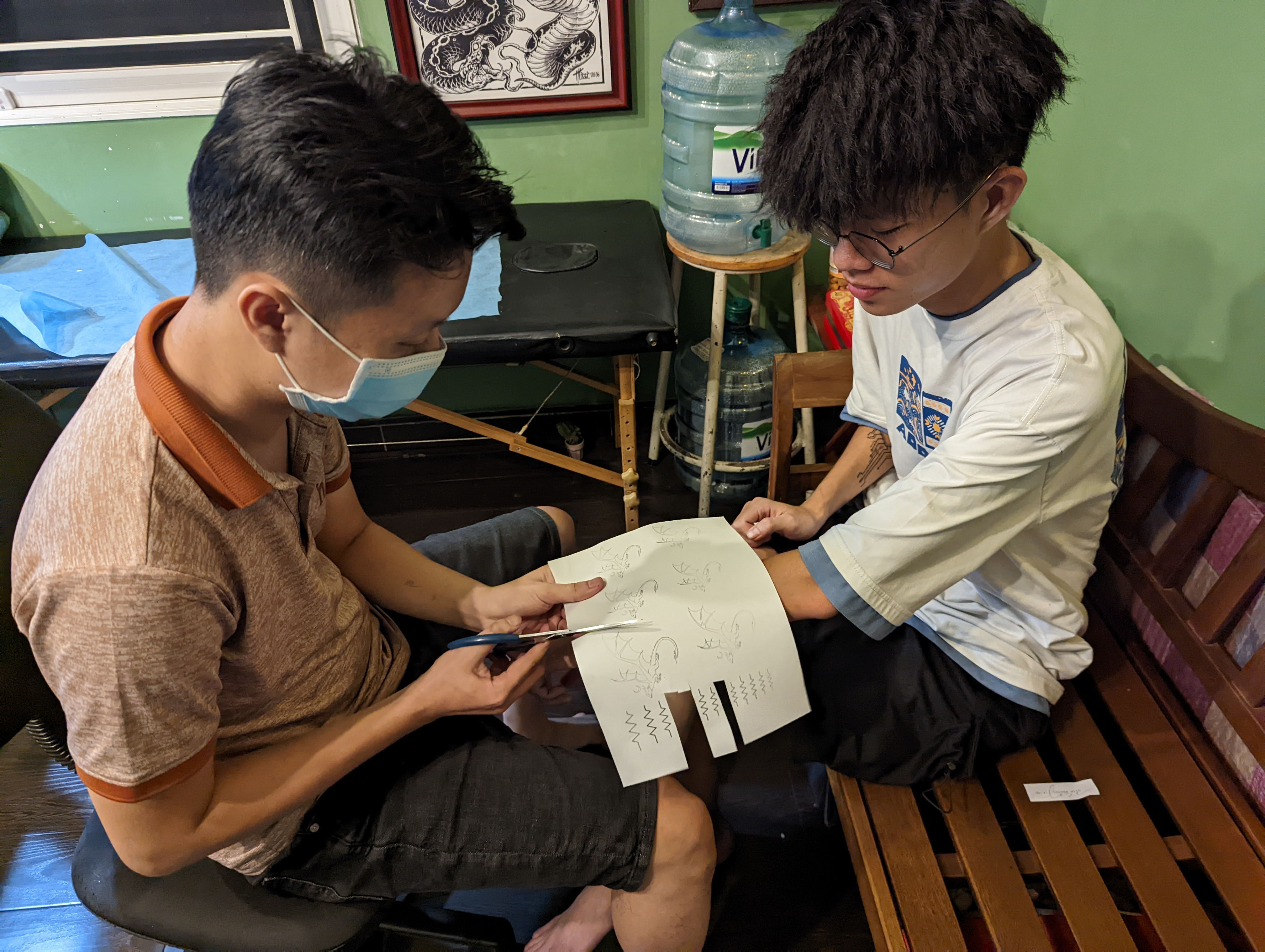 Getting my first tattoos with Matthew at Hoàng Tattoo in Saigon, Vietnam.