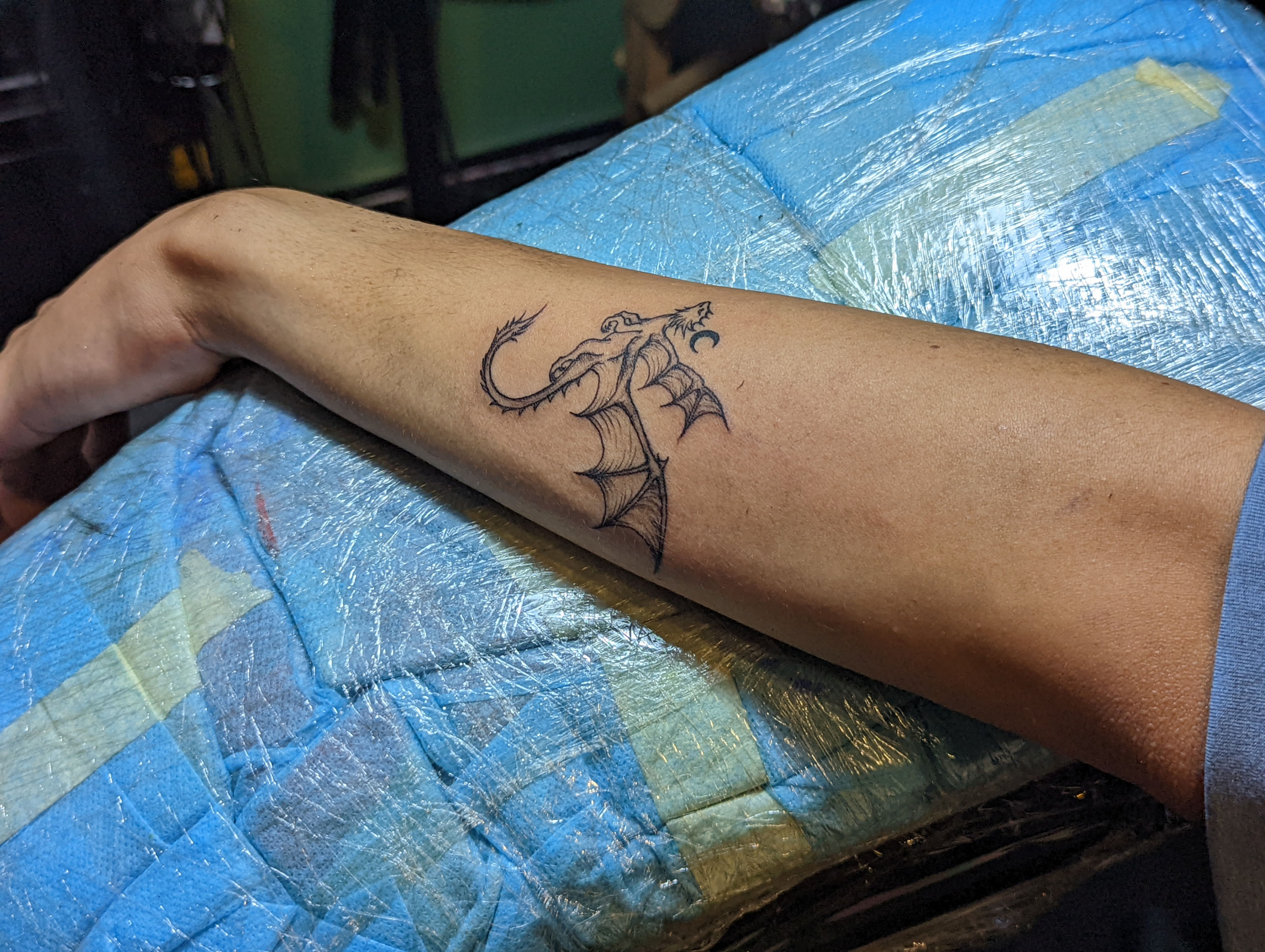 Matthew got his own similar dragon at Hoàng Tattoo in Saigon, Vietnam.