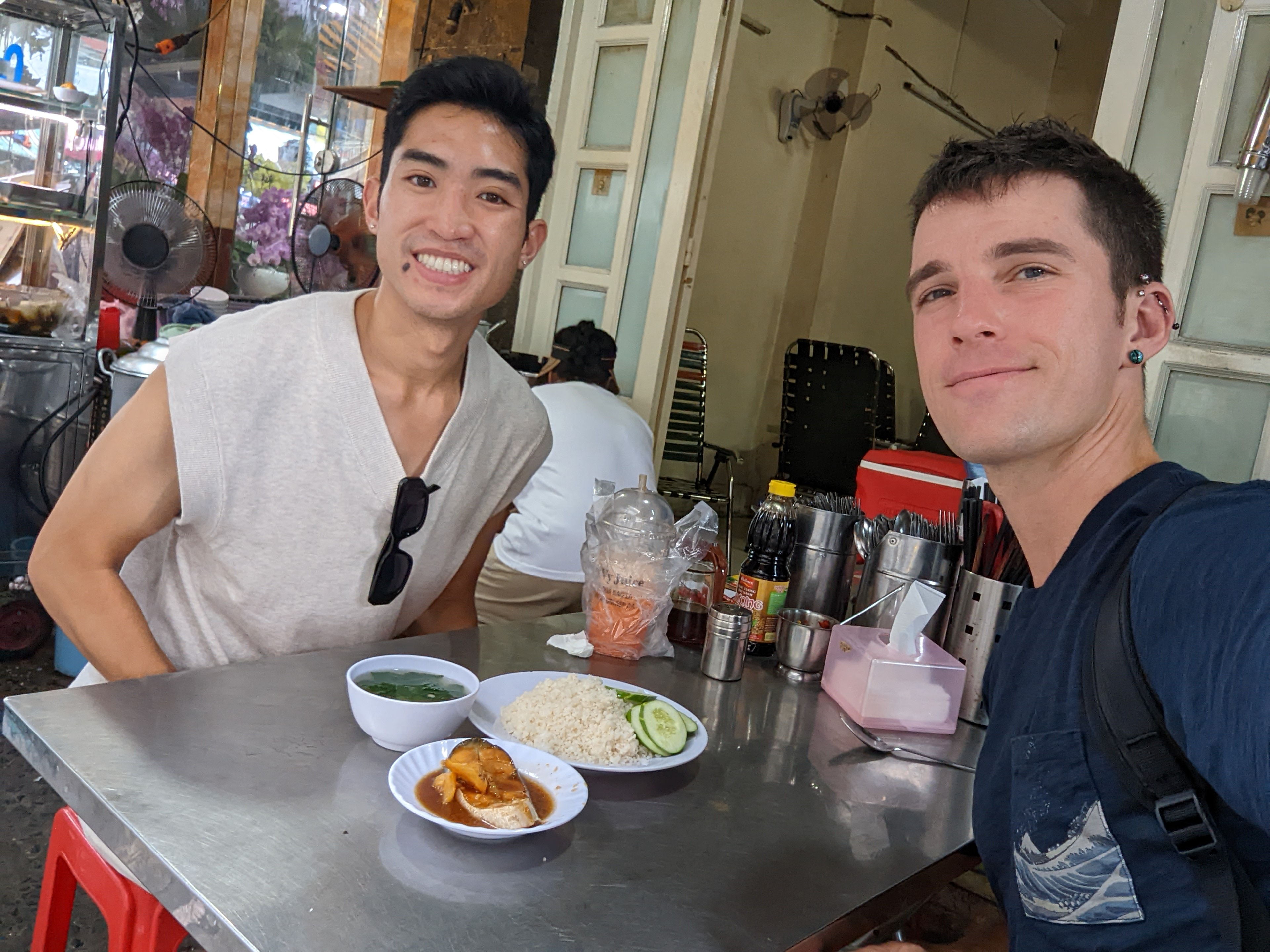 Exploring and getting food at Ho Thi Ky Flower Market, Chợ hoa Hồ Thị Kỷ, in Saigon, Vietnam.