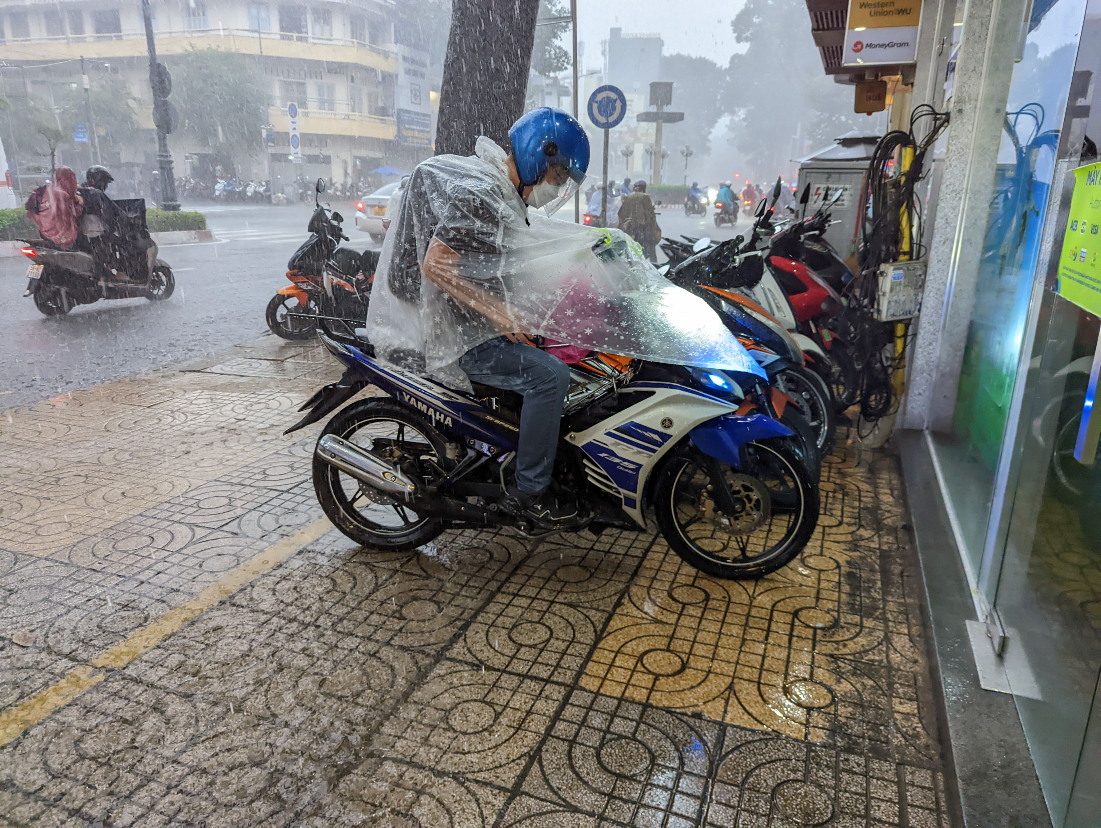 Caught in the rain in Saigon, Vietnam