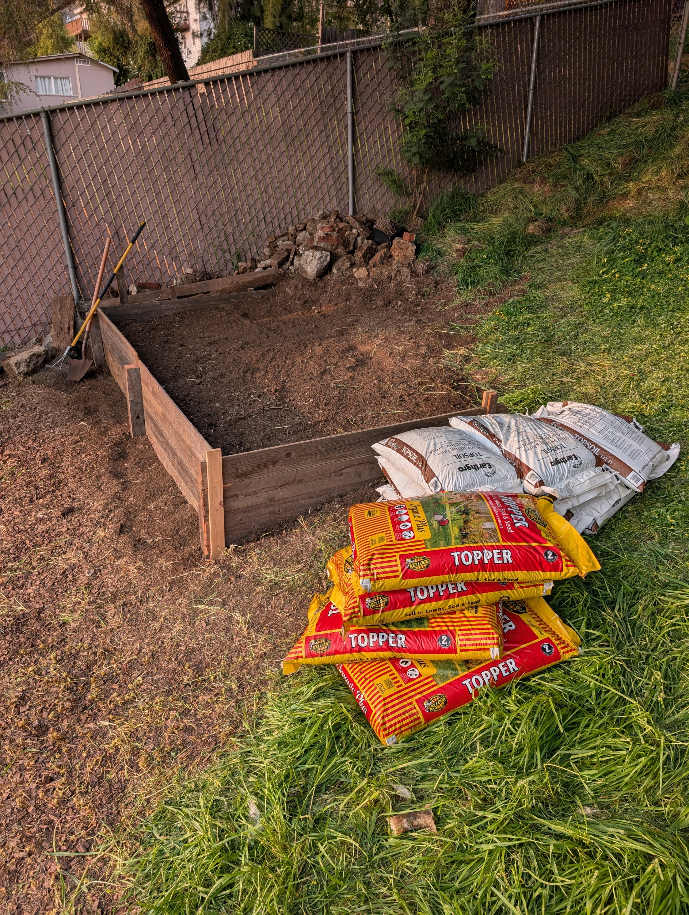 Completed first raised bed using mostly salvaged wood.