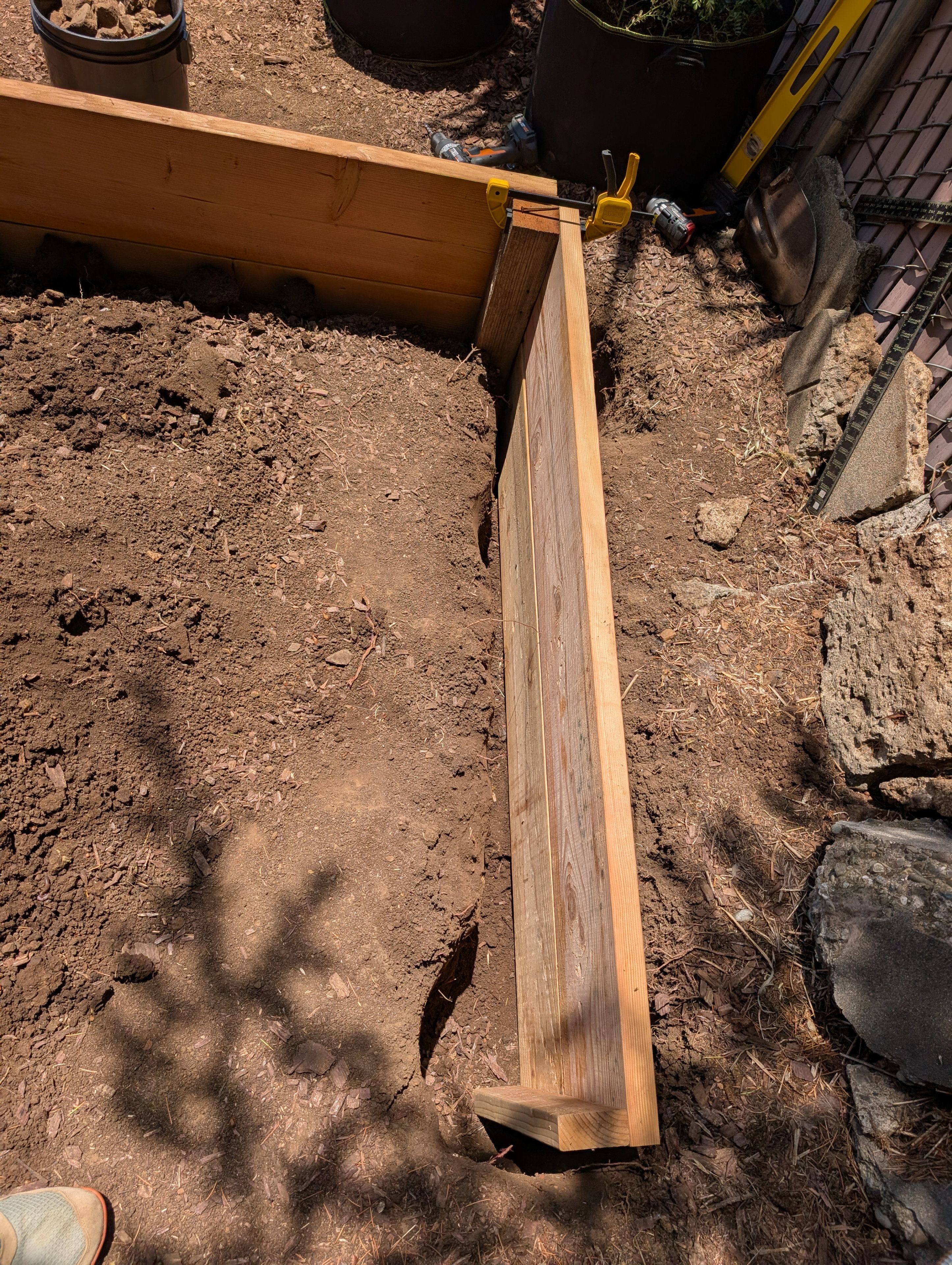 OK, we're building a third raised garden bed now.