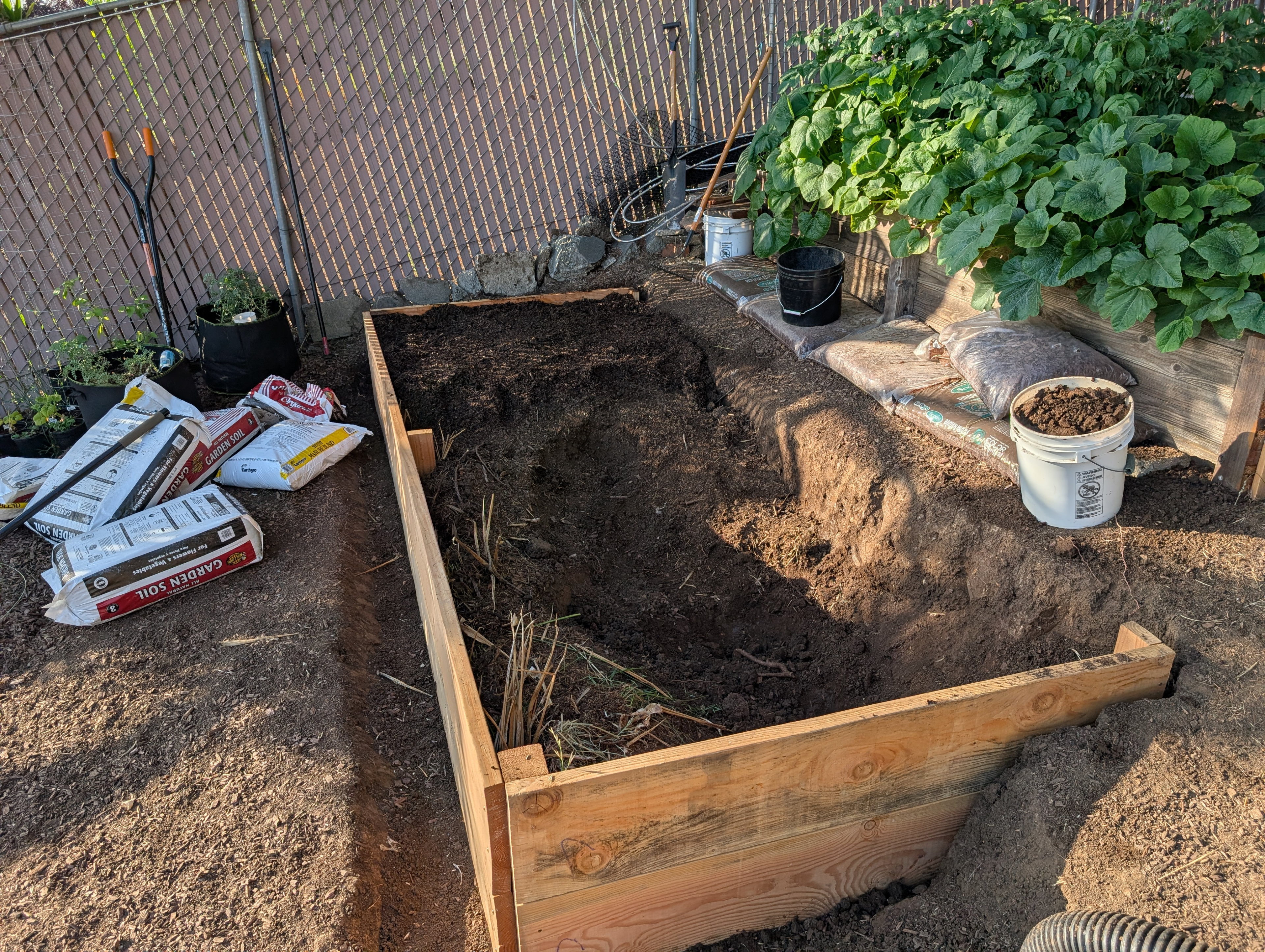 Filling this bed with yard compost and various low grade stuff.