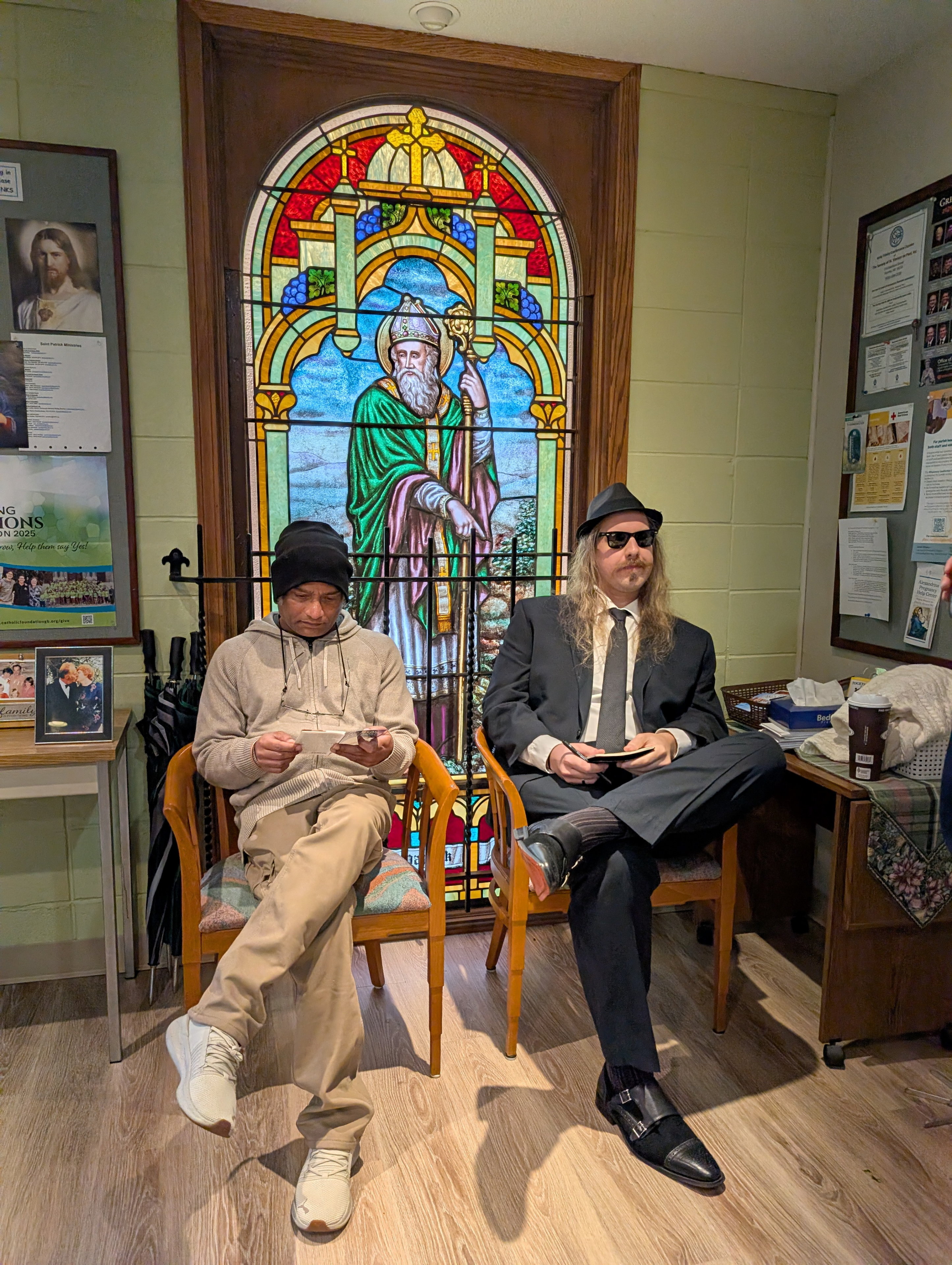 Sri and Ben contemplating before the service for Grandma.