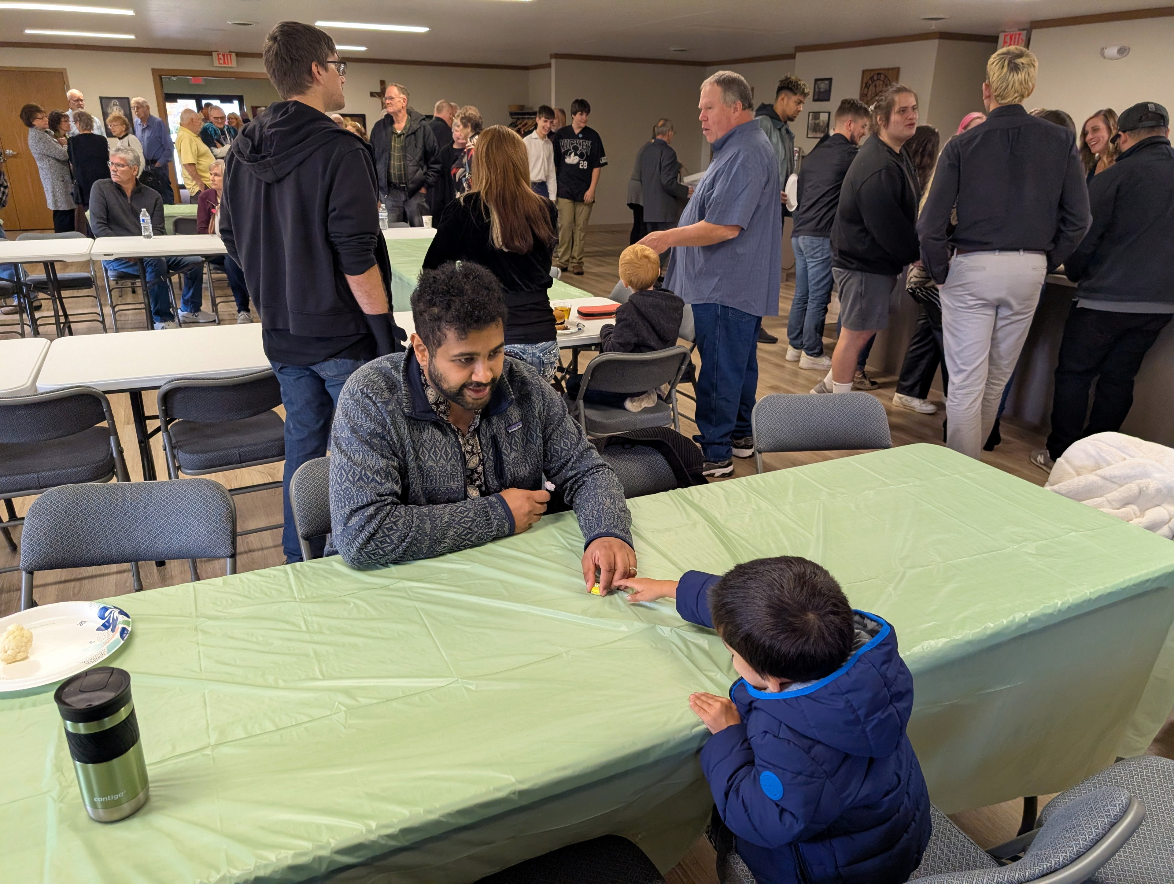 Sukrit and Virgil at the luncheon.