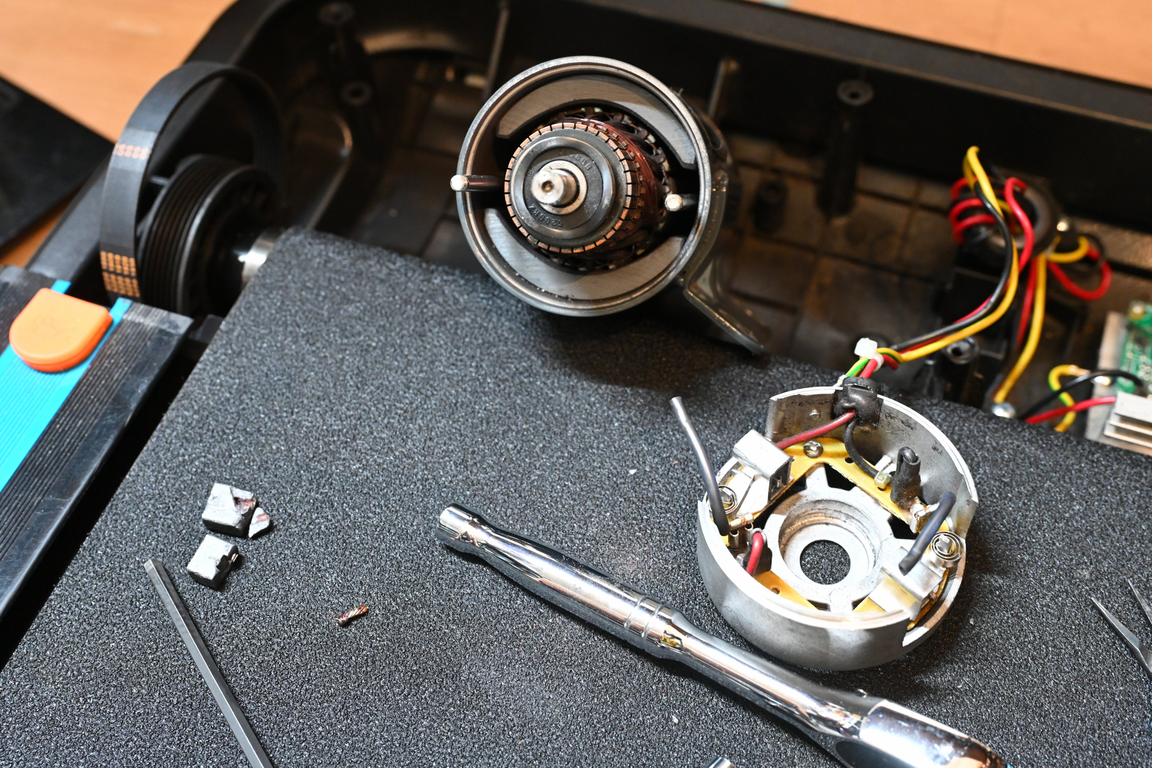 Repairing the treadmill again, this time to replace the graphite brushes and the belt again.