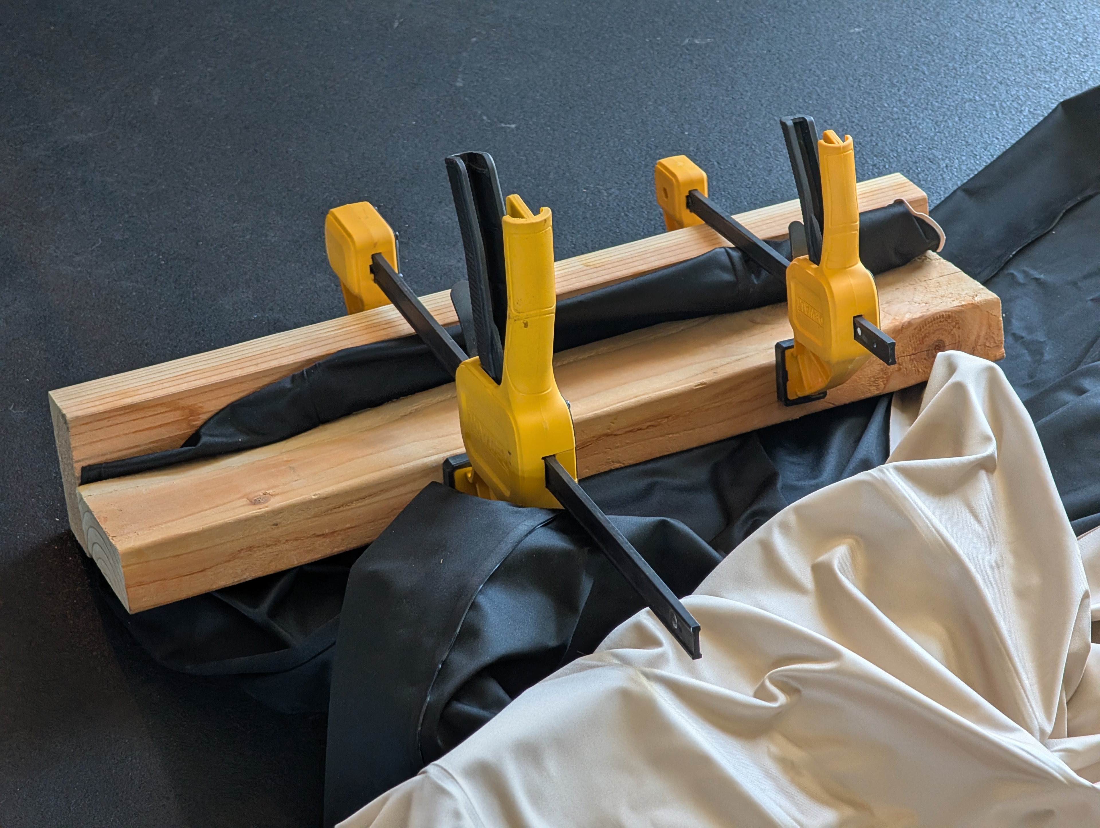 Repairing the air mattress with glue and tape.